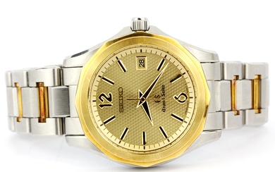 An 18ct and stainless steel quartz Seiko "Grand Seiko GS" wristwatch, (model no. 060050, 9F62-0A70). On a stainless steel and yellow gold al