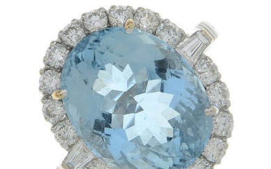 An 18ct gold aquamarine and vari-cut diamond dress ring.
