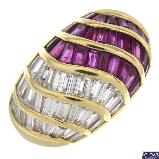 An 18ct gold diamond and ruby bombe ring, by Asprey.