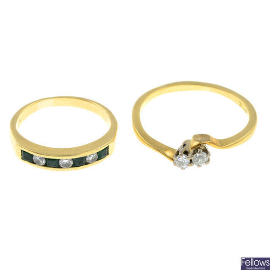 An 18ct gold diamond ring and an emerald and diamond half eternity ring.