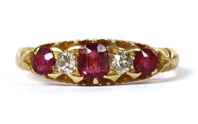 An 18ct gold ruby and diamond five stone ring
