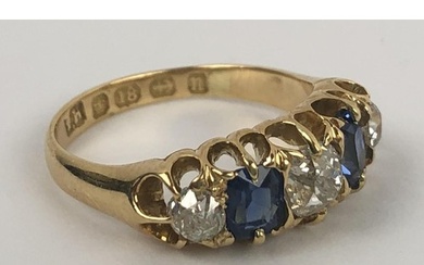 An 18ct gold, sapphire and diamond five stone ring, ring siz...