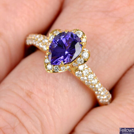 An 18ct gold tanzanite and diamond ring, by Kat Florence.