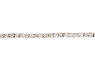An 18ct graduated brilliant-cut diamond line bracelet, with ...