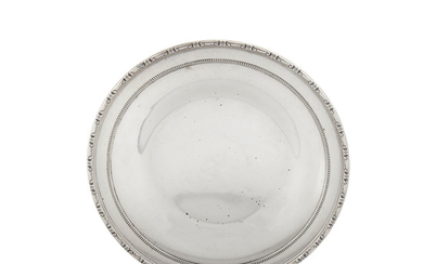 An American sterling silver dinner plate