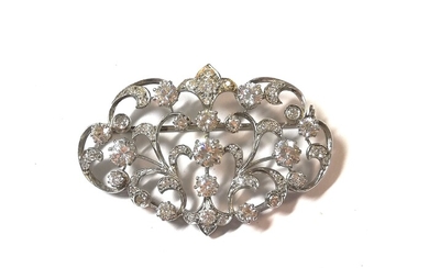 An Edwardian style diamond and cubic zirconia brooch