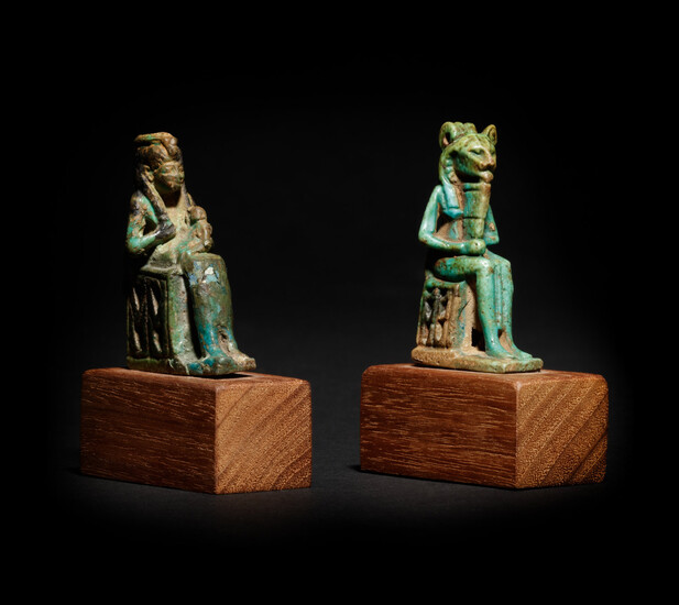 An Egyptian Faience Isis and Horus and an Egyptian Faience Sekhmet