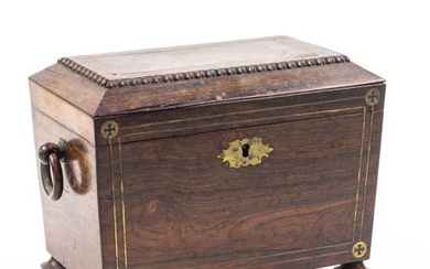An English brass line inlaid rosewood tea caddy, first half 19th century, of sarcophagus form