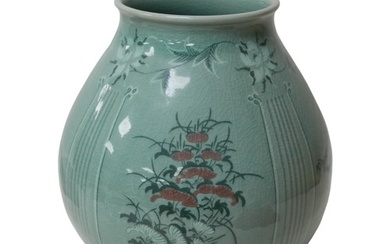 An Oriental celadon baluster form vase, 20th century, decora...