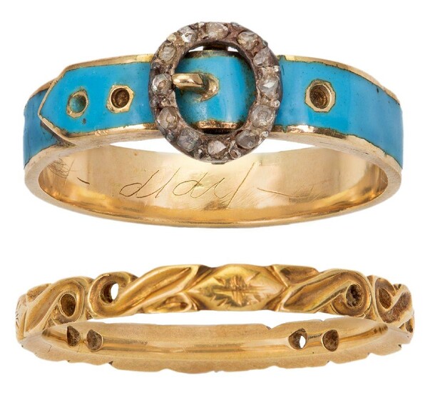 An early 19th century gold, blue enamel and diamond buckle ring and an 18th century gold band ring, the buckle ring applied with a rose-cut diamond buckle motif to a blue enamel band, ring size L, the band ring of scroll design, ring size K
