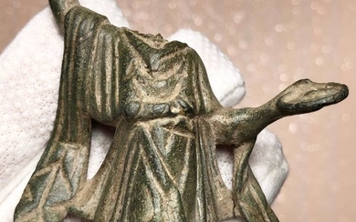 Ancient Roman Bronze Lovely Torso Figurine of the domestic Deity Lares wearing an Opulent Chiton and holding a Patera.