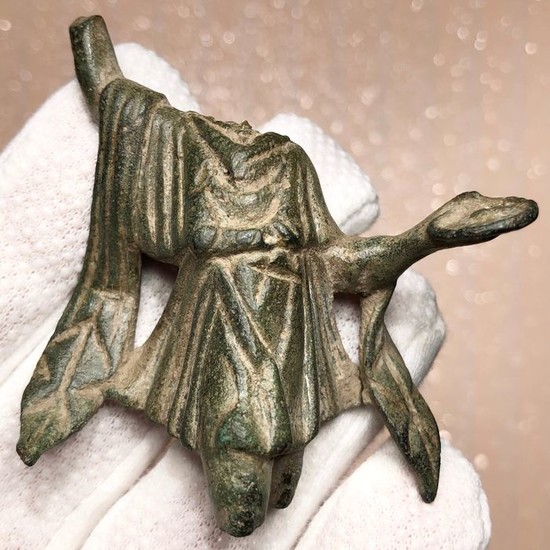 Ancient Roman Bronze Lovely Torso Figurine of the domestic Deity Lares wearing an Opulent Chiton and holding a Patera.