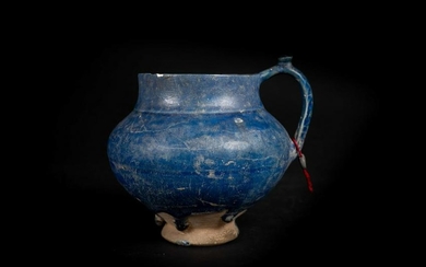 Arte Islamica A blue glazed pottery jug Iran, 13th