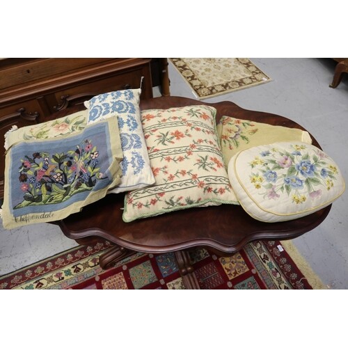 Assortment of tapestries and needlework cushions