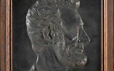 BUST PROFILE OF ABRAHAM LINCOLN Early 20th Century Cast aluminum, 12.5" x 8". Framed 14.5" x 10".