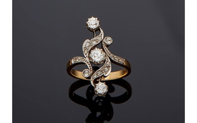 Bague "Belle Epoque" en or jaune 18 carats (750/000), platine (950/000) et diamants, composée d'un...