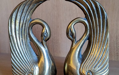 [Bookends]. A pair of swan bookends, brass, partly polished, both...