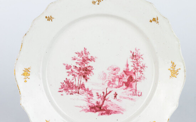 Bord. Zacht Doorniks porselein. 18de-eeuws werk. In medaillon decor in roze camaïeu van een pelgrim op een veldweg nabij