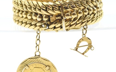 Bracelet en or jaune 18 ct avec 2 pendentifs attachés en or jaune 18 ct...