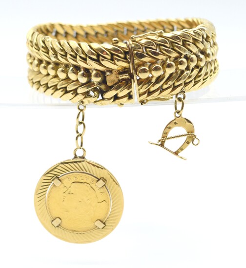 Bracelet en or jaune 18 ct avec 2 pendentifs attachés en or jaune 18 ct...