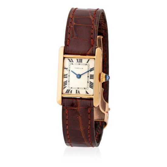 Cartier. Very Attractive Mini-Tank Rectangular-Shape Wristwatch in Yellow Gold, Silver Dial and Black Roman Numbers