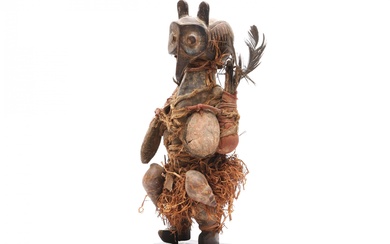 D.R. Congo, Yaka, power figure with a bird's head, cotton, feathers.