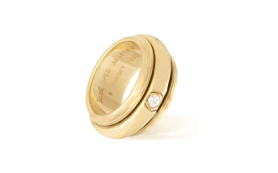 Description A GOLD AND DIAMOND "POSSESSION" RING, BY PIAGET,...