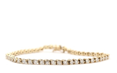 Diamond Tennis bracelet set with numerous brilliant-cut diamonds totalling app. 3.60 ct., mounted in 14k gold. L. 18.5 cm. Weight app. 8.5 g.