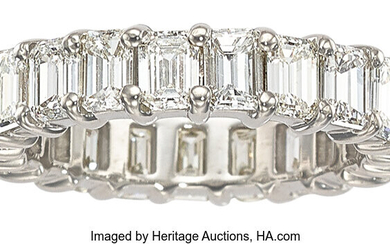 Diamond, White Gold Eternity Band Stones: Emerald-cut diamonds weighing...