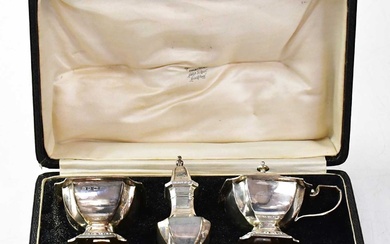 EDWARD BARNARD & SONS; a matched hallmarked silver cruet set,...