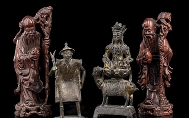 FOUR WOOD AND BRONZE SCULPTURES China Two wooden Shoulao; one...