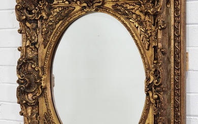 French gilt mirror with heavy relief (79 x 90cm)