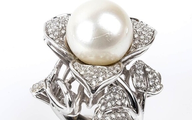 Gold, Australian pearl and diamonds ring18k white gold, in the shape of a flower, with...
