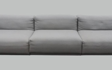 Jasper Morrison, two ‘Soft’ modular three seater sofas for Vitra, c.2015, with grey fabric upholstery, comprising of four end pieces and two middle, each are 65cm high, 324cm wide, 96cm deep (2)