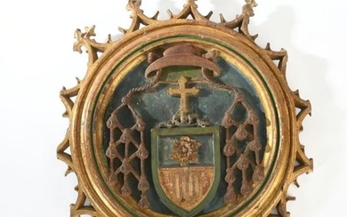 LARGE MEDAL in polychrome wood with a coat...