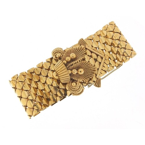 Large 9ct gold belt and buckle design bracelet with floral b...