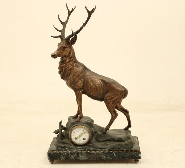 Large French patinated bronze clock with stag