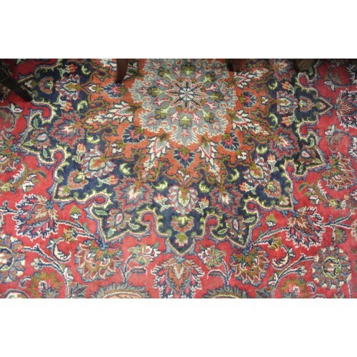 Large red ground hand woven Persian Mashad carpet traditiona...
