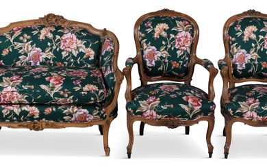 MATCHED ROCOCO STYLE WALNUT AND BEECHWOOD THREE-PIECE SUITE OF SEAT FURNITURE Armchairs: 37 x 26 3/4 x 26 in. (94 x 67.9 x 66 cm.), Width of settee: 45 in. (114.3 cm.)