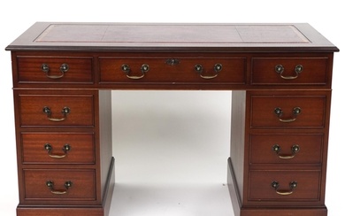 Mahogany twin pedestal desk with red tooled leather insert f...
