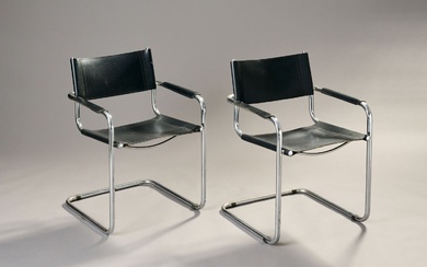 Marcel BREUER (1902-1981), dans le goût de. Paire de fauteuils à structure tubulaire en métal...