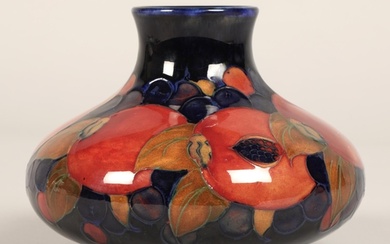 Moorcroft pottery vase, of squat form, blue ground in the po...