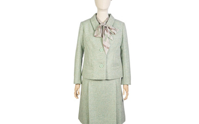 Olivia Colman (as The Queen): A bouclé skirt suit ensemble...