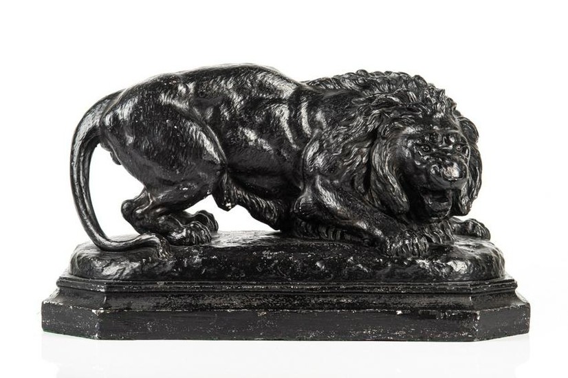 PAINTED PLASTER STATUE OF CROUCHING LION