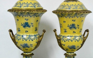 Pair of French Porcelain Urns.