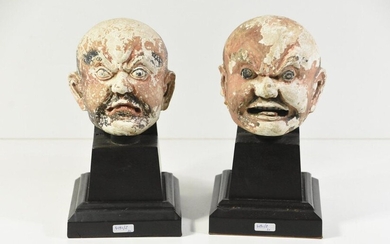 Pair of antique terracotta heads, China (Total height 28cm)