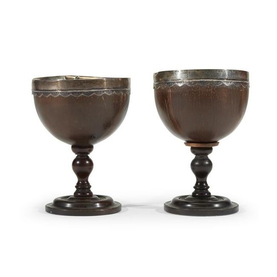 Pair of silver-mounted coconut goblets associated with