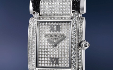 Patek Philippe, Ref. 4910 A highly rare and attractive white gold and diamond-set quartz wristwatch
