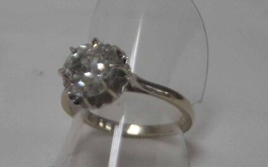 Ring in 18 kt white gold with a diamond solitaire of about 2 carats in caliber (graining, inclusions visible to the naked eye, 2 scratches on the edges). Gross weight : 3,74 g. TDD 54 1/2