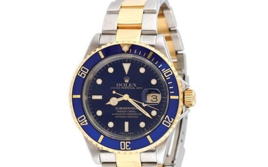 Rolex Submariner wristwatch, gold and steel, men, stainless steel; yellow gold 18 k, d=43 mm / Gold and steel Rolex Submariner watch, reference 16613, automatic movement, 3135 gauge, 40 h time reserve. Blue coloured dial, luminescent time indices...
